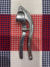 Roger Orfèvre 2-in-1 garlic crusher and olive/cherry pitter