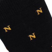 Napoleon ‘N’ allover black socks by Maison Broussaud