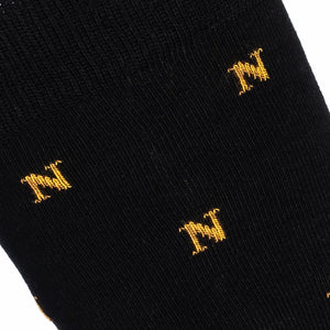 Napoleon ‘N’ allover black socks by Maison Broussaud